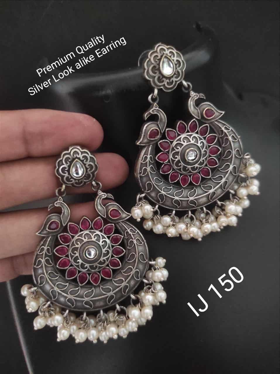 The Twirling Peacock- Oxidised Jhumka Earrings